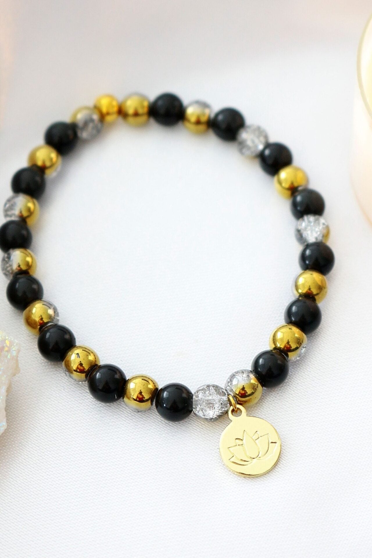 Obsidian Elastik-Armband mit 24K Lotusblume